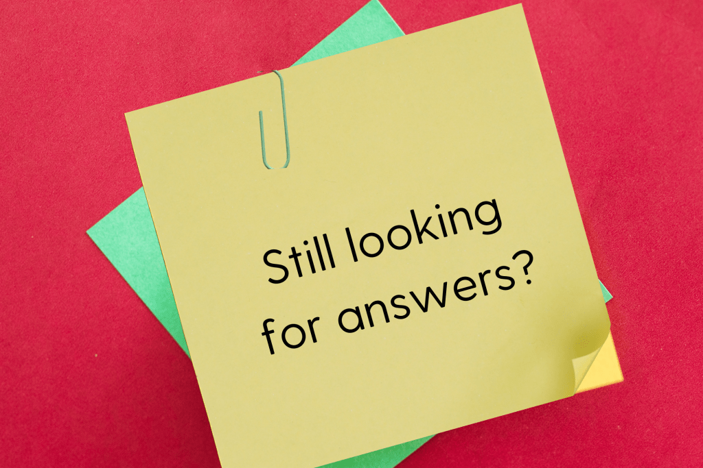 A yellow sticky note with a paperclip on a red background reads, "Still looking for answers?.